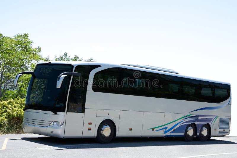 Grease travel bus on road. Grease travel bus on road