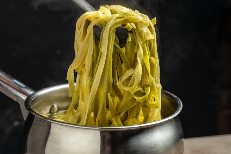 Fettuccine Pasta in Pan Cooking in Boiling. Top View Stock Image