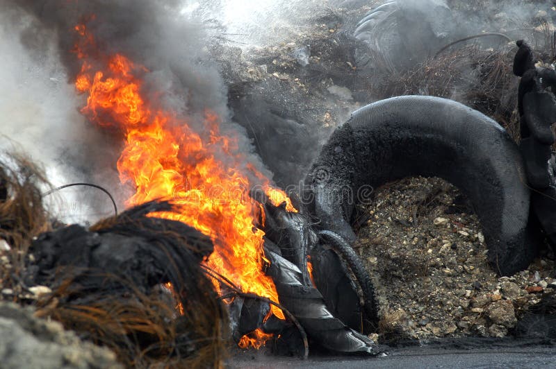 Fire of a stock with old tyres. Fire of a stock with old tyres