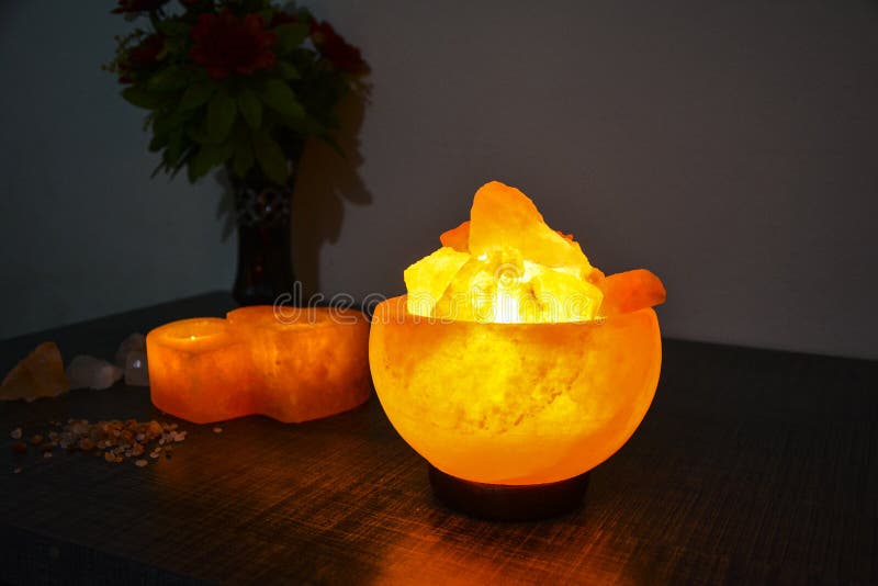 Customers` favorite Fire Bowl Salt Lamp. Looks great in bedroom and on office table. Its 2 to 3 kg in weight. Looks like burning embers in a bowl. 

Natural lamps are famous all over the world for their unique beautiful light. These salt lamps emit colorful apricot, yellow & orange light. These are carefully crafted from rock salt taken from mines in Salt Range Mountain located near Quaidabad, Khushab, Pakistan. Natural salt lamps are used to decorate drawing rooms, offices & bedrooms. It ionizes and purifies the air which can be very healthful for asthma & patients with joint pains. Today, the health benefits of ionizers are well recognized; whilst most ionizers in the market are manmade, the crystal salt lamps are Mother Nature`s beautiful alternative. Customers` favorite Fire Bowl Salt Lamp. Looks great in bedroom and on office table. Its 2 to 3 kg in weight. Looks like burning embers in a bowl. 

Natural lamps are famous all over the world for their unique beautiful light. These salt lamps emit colorful apricot, yellow & orange light. These are carefully crafted from rock salt taken from mines in Salt Range Mountain located near Quaidabad, Khushab, Pakistan. Natural salt lamps are used to decorate drawing rooms, offices & bedrooms. It ionizes and purifies the air which can be very healthful for asthma & patients with joint pains. Today, the health benefits of ionizers are well recognized; whilst most ionizers in the market are manmade, the crystal salt lamps are Mother Nature`s beautiful alternative.