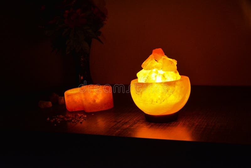 Customers` favorite Fire Bowl Salt Lamp. Looks great in bedroom and on office table. Its 2 to 3 kg in weight. Looks like burning embers in a bowl. 

Natural lamps are famous all over the world for their unique beautiful light. These salt lamps emit colorful apricot, yellow & orange light. These are carefully crafted from rock salt taken from mines in Salt Range Mountain located near Quaidabad, Khushab, Pakistan. Natural salt lamps are used to decorate drawing rooms, offices & bedrooms. It ionizes and purifies the air which can be very healthful for asthma & patients with joint pains. Today, the health benefits of ionizers are well recognized; whilst most ionizers in the market are manmade, the crystal salt lamps are Mother Nature`s beautiful alternative. Customers` favorite Fire Bowl Salt Lamp. Looks great in bedroom and on office table. Its 2 to 3 kg in weight. Looks like burning embers in a bowl. 

Natural lamps are famous all over the world for their unique beautiful light. These salt lamps emit colorful apricot, yellow & orange light. These are carefully crafted from rock salt taken from mines in Salt Range Mountain located near Quaidabad, Khushab, Pakistan. Natural salt lamps are used to decorate drawing rooms, offices & bedrooms. It ionizes and purifies the air which can be very healthful for asthma & patients with joint pains. Today, the health benefits of ionizers are well recognized; whilst most ionizers in the market are manmade, the crystal salt lamps are Mother Nature`s beautiful alternative.