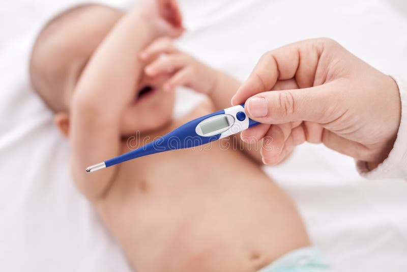Fever, measuring temperature for little baby