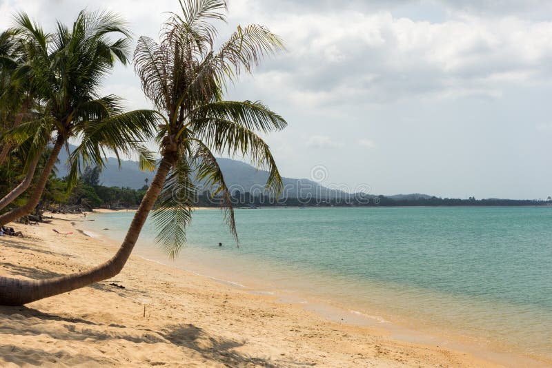 Few people at a quiet Maenam Beach in Thailand