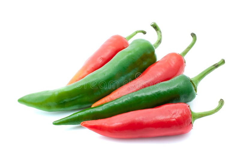 Few red and green chili peppers isolated on the white background