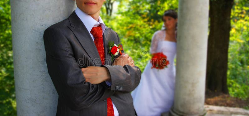 Fiance near the column.