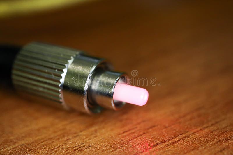 Fiber optic cable connector FC closeup royalty free stock photos