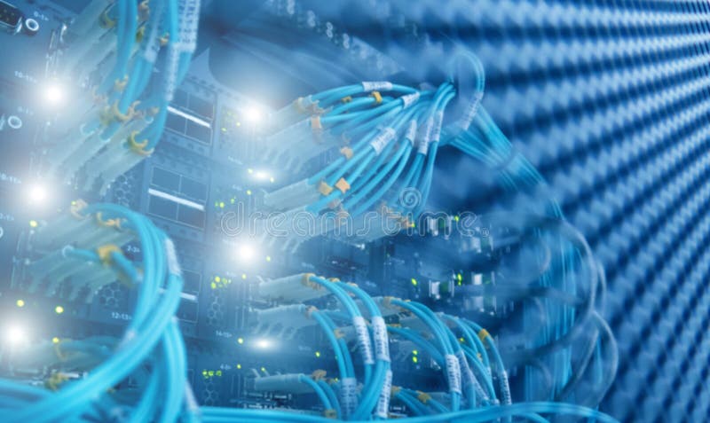 Fiber Optical connector interface. Blurred technology background blue light. royalty free stock images