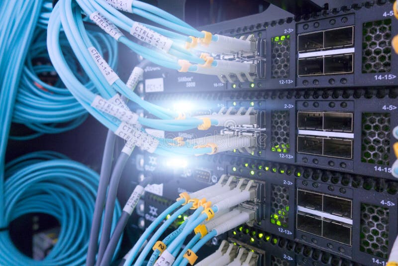 Fiber Optical connector interface. Fiber cable serve with technology style against fiber optic background. stock photography