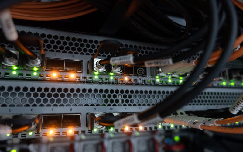 Fiber optical switch with connected FC cables in server room royalty free stock image