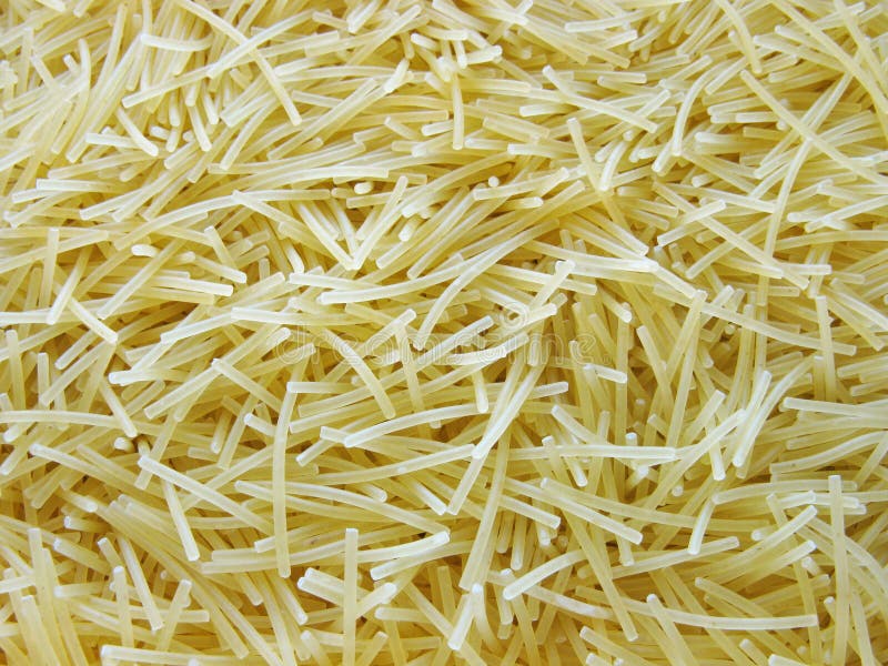 Fideos secos Macarrones Pastas Fondo imágenes de archivo libres de regalías Fideos secos Macarrones Pastas Fondo imágenes de archivo libres de regalías