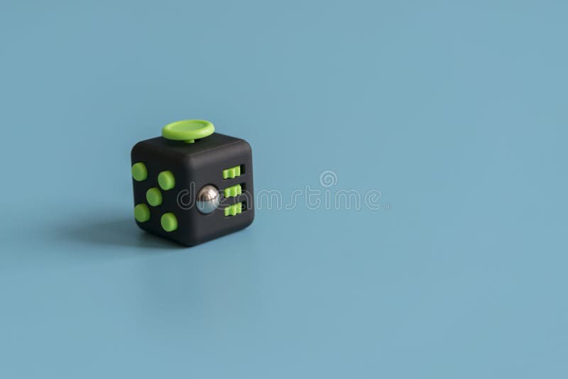 Fidget Cube Stress Reliever Fingers Toy On A Blue Background Stock Photo Image Of Document Antistress