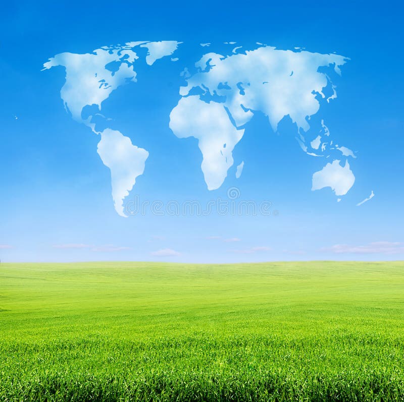 Field of grass with world shaped clouds royalty free stock image