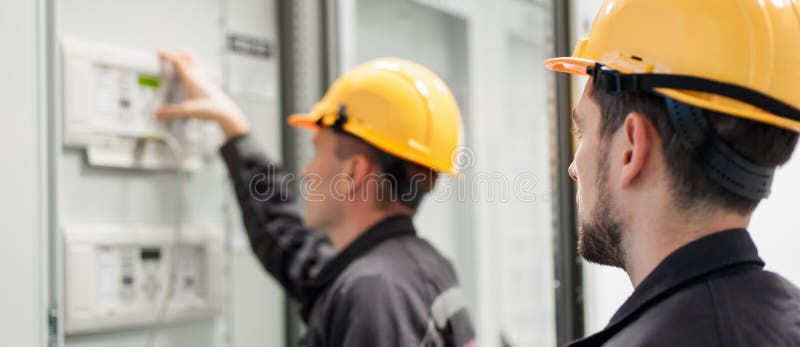 Field service crew testing electronics or inspecting electrical stock images