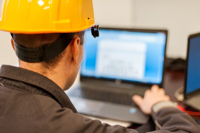 Field Service Engineer Inspect Relay Protection System with Laptop