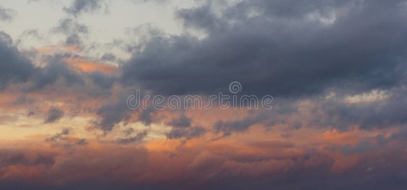 A fiery orange, pink and gentle blue sunset sky