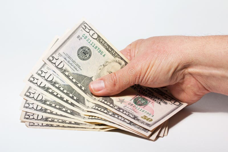 Closeup Of Fifty Dollar Bills On Wooden Table. Fifty Dollar Stock