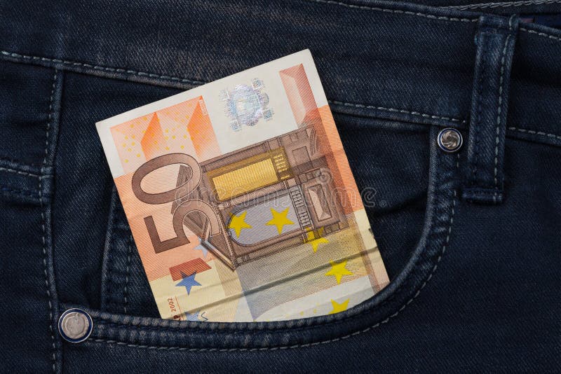 Fifty euro banknote money in pocket jeans pants background texture. 50 euro close up stock image Fifty euro banknote money in pocket jeans pants background texture. 50 euro close up stock image