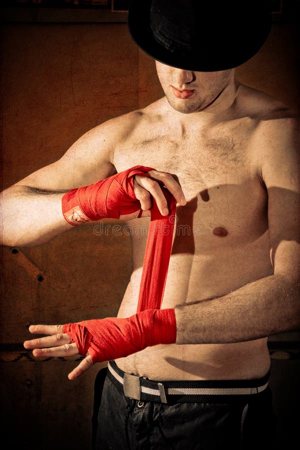Fighter bandages his arm stock photography