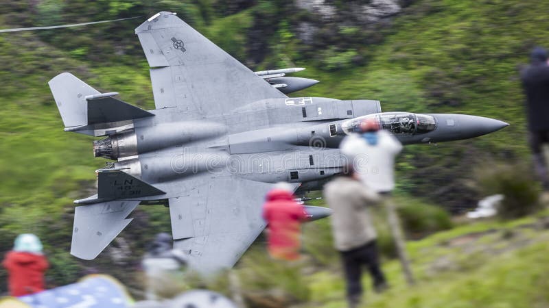 Fighter Jet Flying Low Between Valley And People Mach Loop UK Editorial fighter-jet-flying-low-between-valley-and-people-mach-loop-uk-editorial