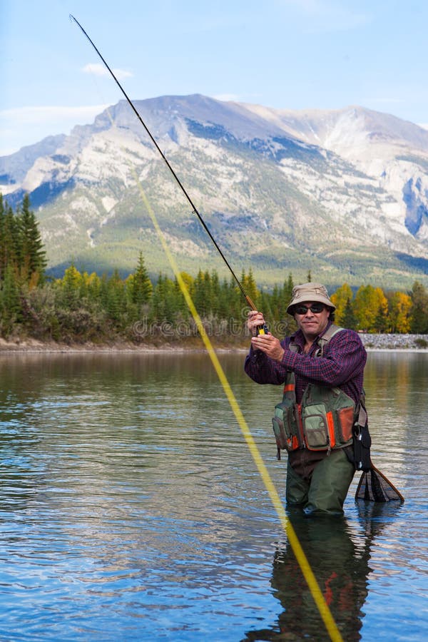 Fighting a fish royalty free stock photo