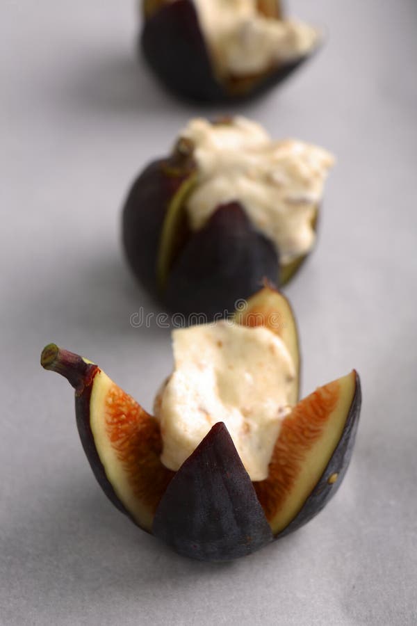 Figs Roasted with Mascarpone Cheese Honey and Hazelnuts Stock Image
