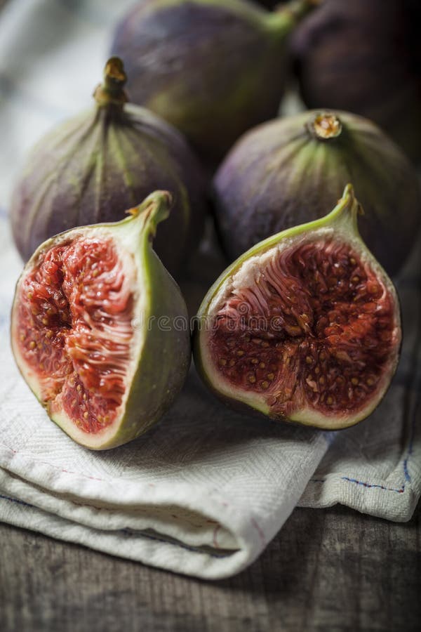 Delicious figs on wooden background. Delicious figs on wooden background