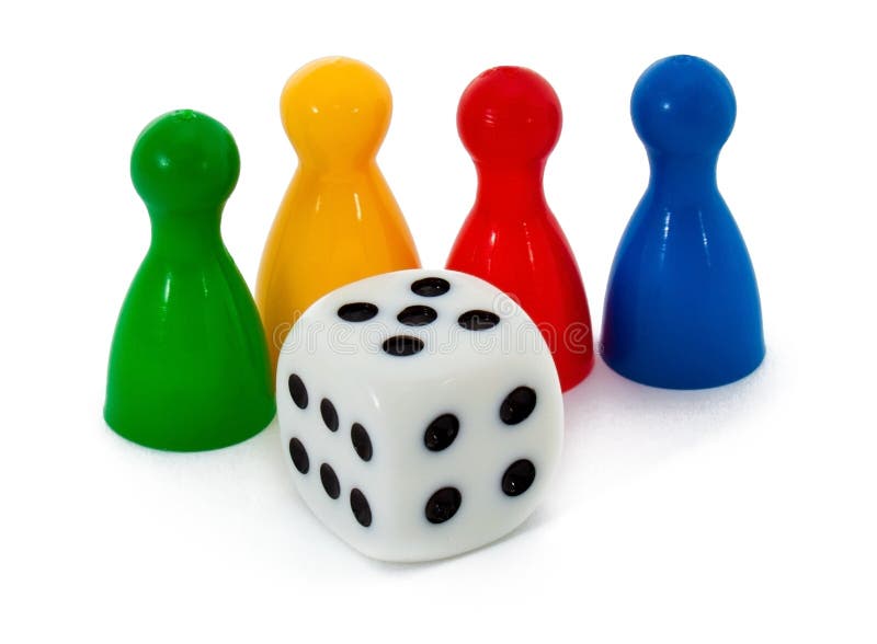 Figuras y dados del juego de mesa fotos de archivo
