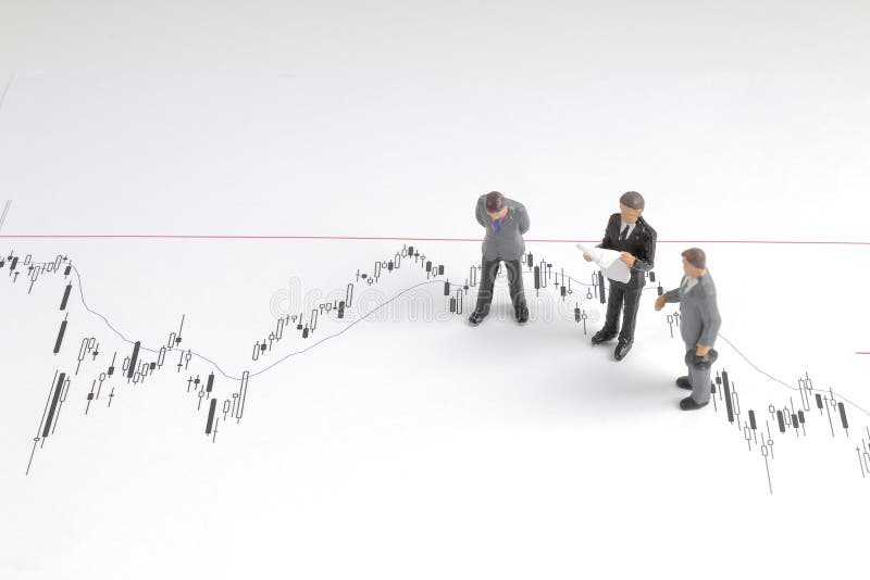 Figure Look Skeptically on a Graph with Stock Prices. Stock Photo