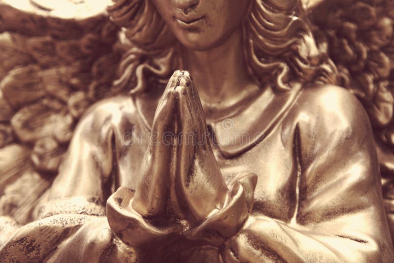 Figure of a praying angel