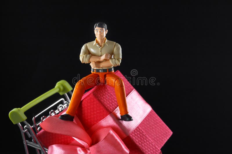 The figure of a satisfied man who bought a great product at a bargain price stock image The figure of a satisfied man who bought a great product at a bargain price stock image