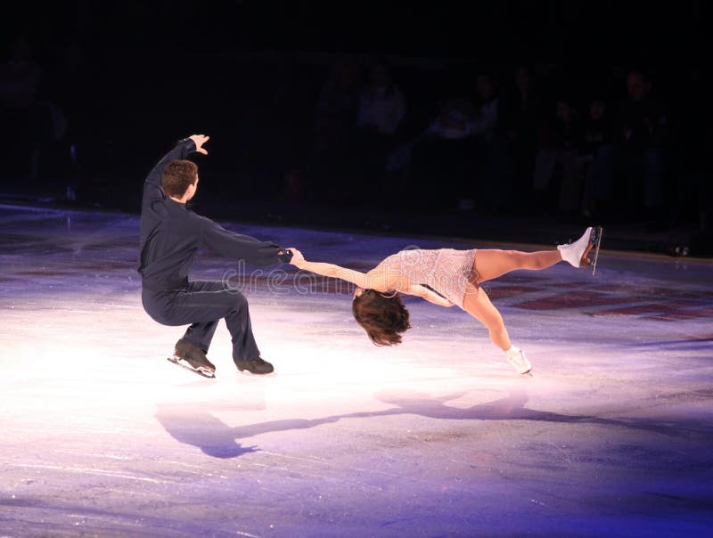 Professional man and woman figure skaters performing at Stars on ice show