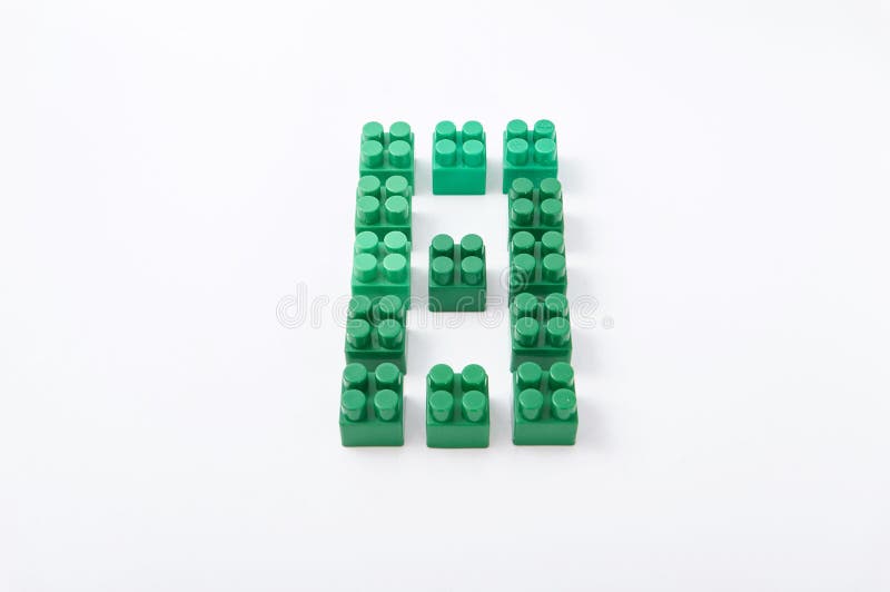 Figures from a colored cubes designer on a white background stock photo