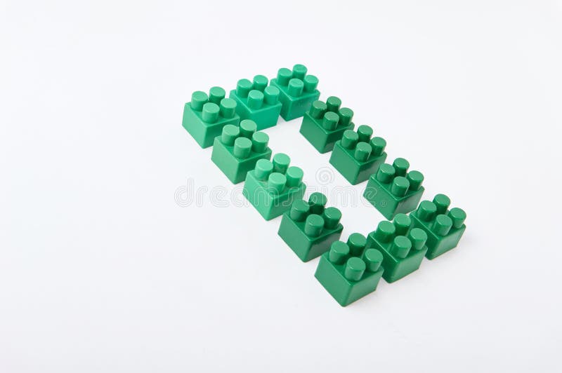 Figures from a colored cubes designer on a white background royalty free stock images