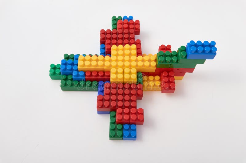Figures from a colored cubes designer on a white background stock images