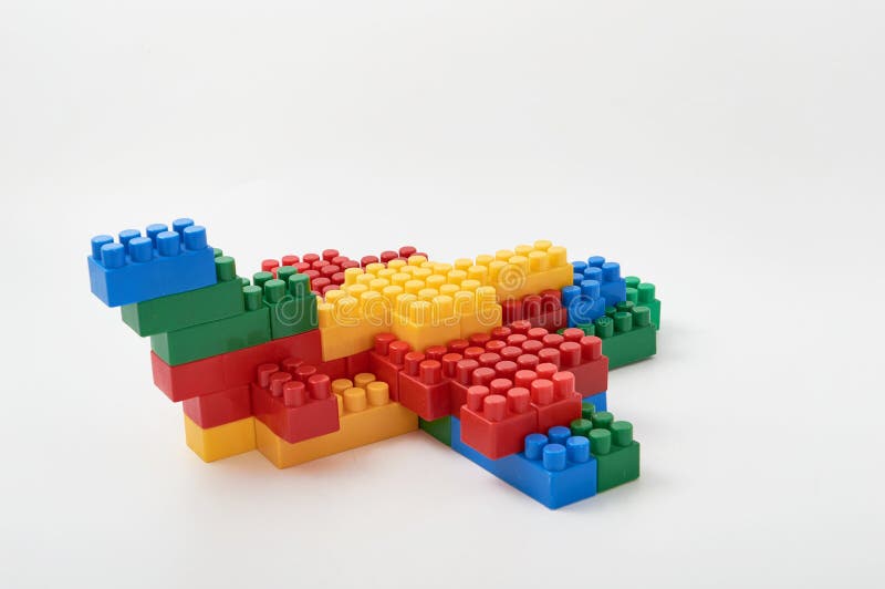 Figures from a colored cubes designer on a white background stock images