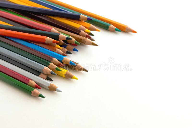 Figures with colored pencils on white background stock photo