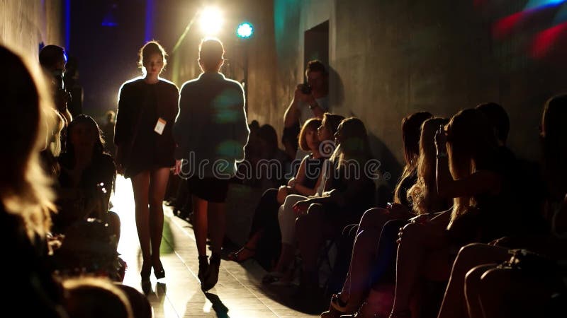 Female Models Walk Runway in Beautiful Dresses during a Fashion Show ...