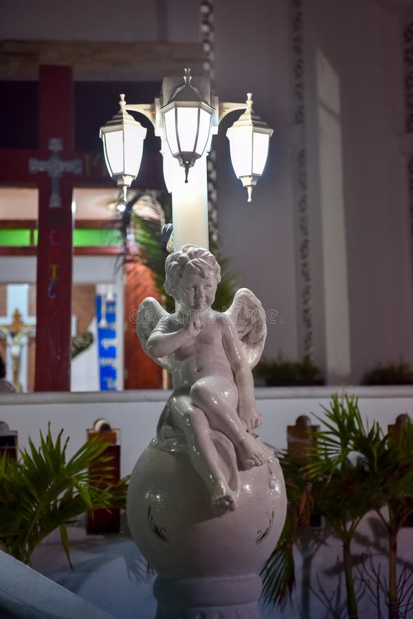 Figurine of an Angel Under the Lamp. Stock Image Image of ornament