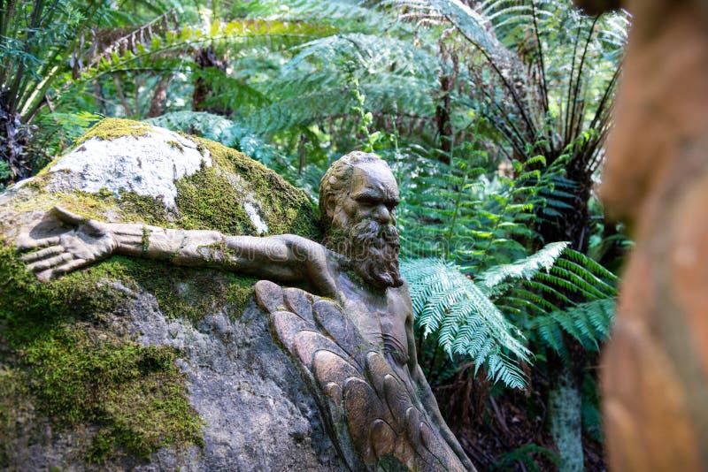 Figurine in forest of Dandenong mountain ranges of Melbourne Australia William Ricketts
