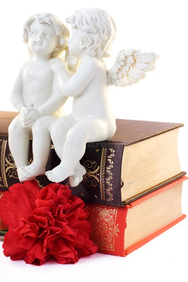 Figurine of two angels and book