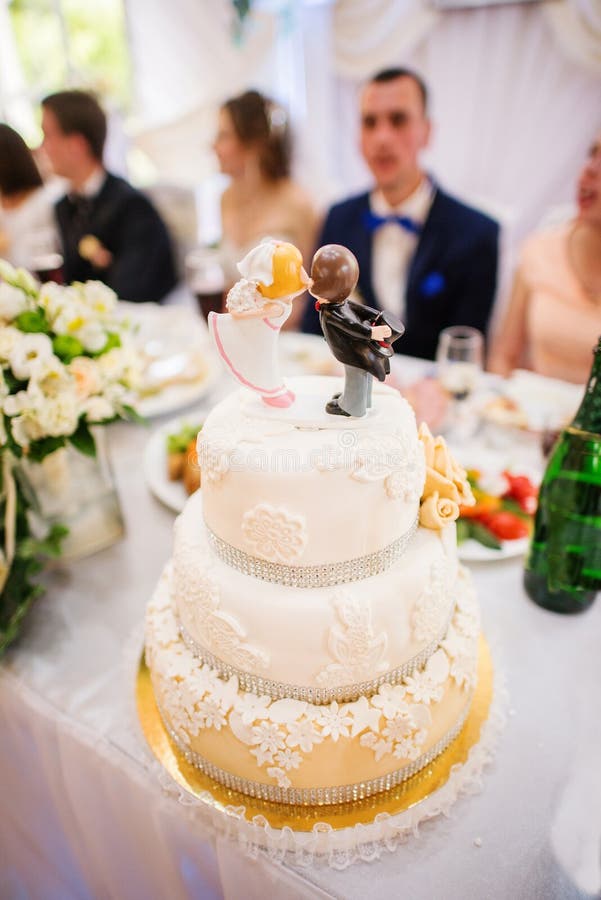 Figurines on top of cake stock photo. Image of couple 56785914