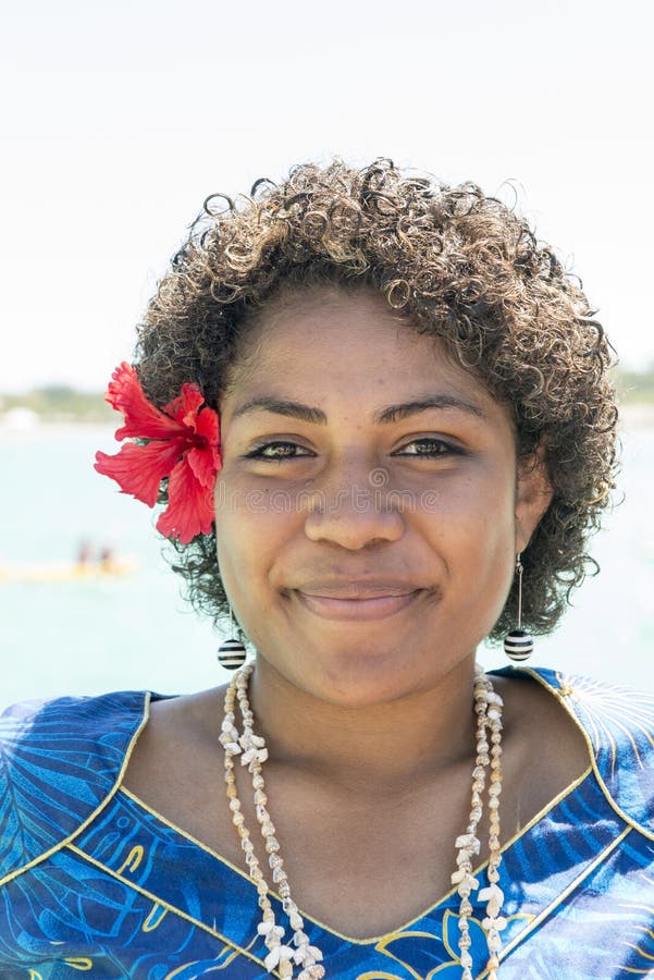 Fijian woman with Hibiscus Bloom