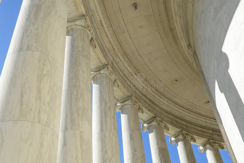 White Pillars in a row with blue sky background. White Pillars in a row with blue sky background