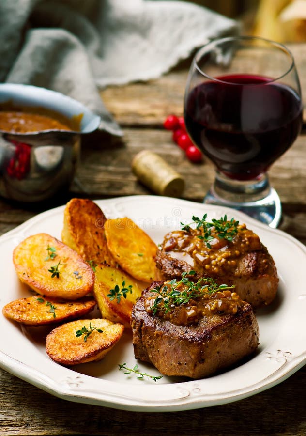 Filet Mignon with a Mustard Sauce stock photo Filet Mignon with a Mustard Sauce stock photo