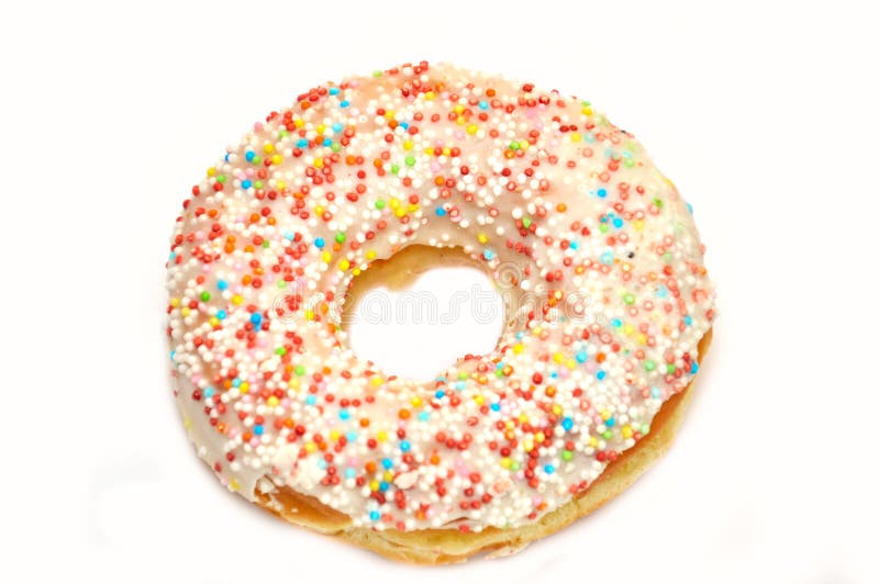 Rosquinha cor-de-rosa com recheio de doces fotografia de stock