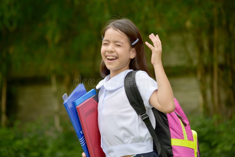 Filipina Girl Student Laughing with Notebooks Stock Image - Image of ...