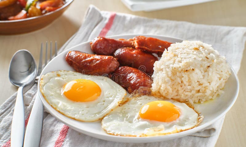 Filipino Silog Breakfast with Garlic Fried Rice, Longsilog, and Two