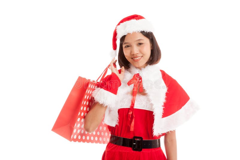 Fille asiatique de Santa Claus de Noël avec des paniers