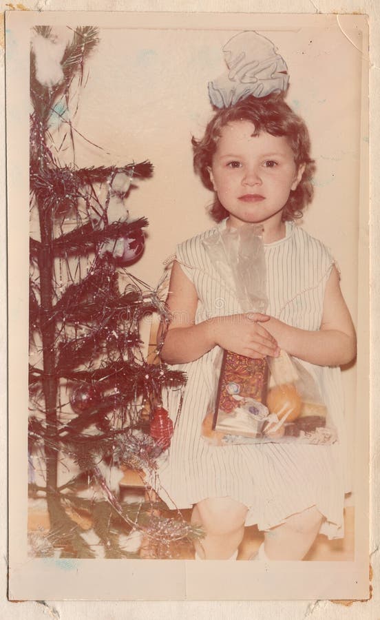 Fille avec des cadeaux de Noël photographie stock Fille avec des cadeaux de Noël photographie stock