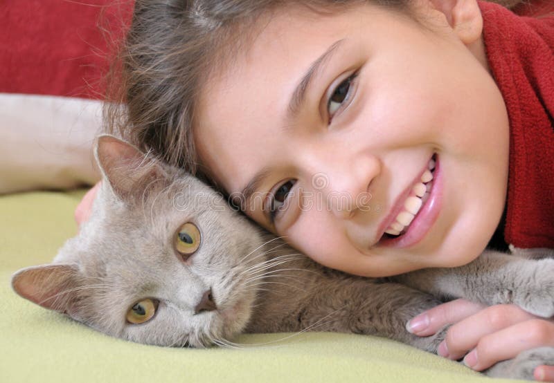 Fille avec le chat photo stock Fille avec le chat photo stock